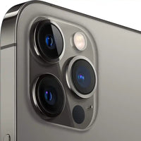Close-up of a smartphone camera module on a gray background,graphite